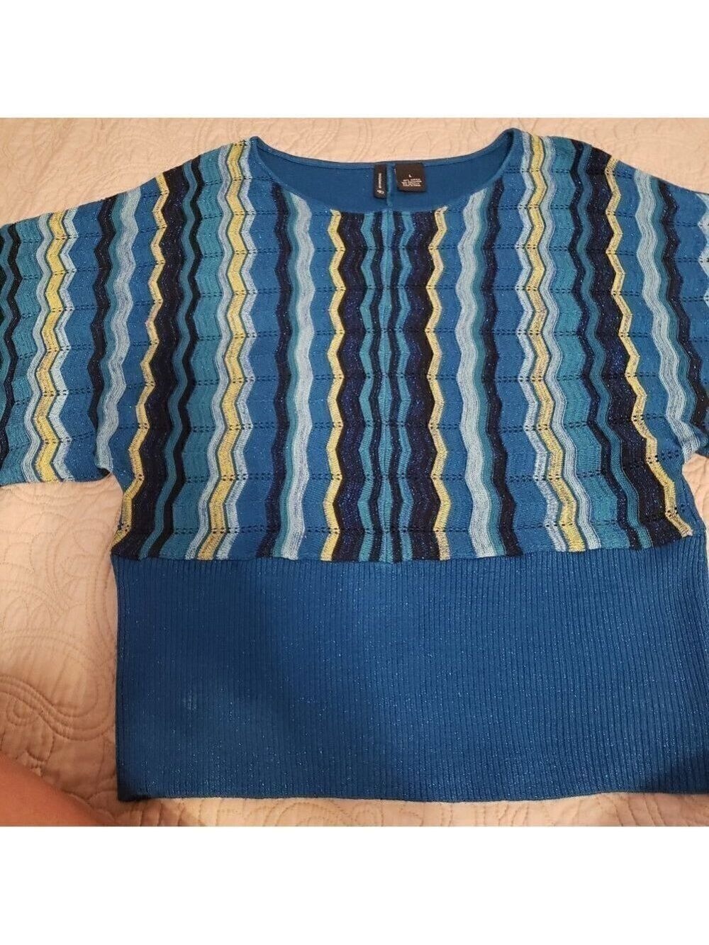 NEW Directions sweater.